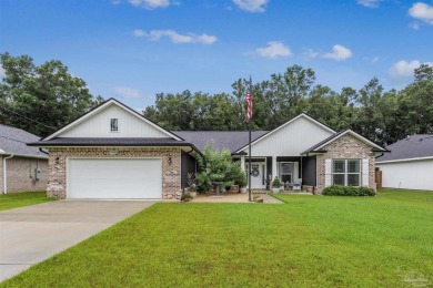 At only two years old, this gorgeous 4-bed, 2-bath home backs on Tanglewood Golf Club in Florida - for sale on GolfHomes.com, golf home, golf lot