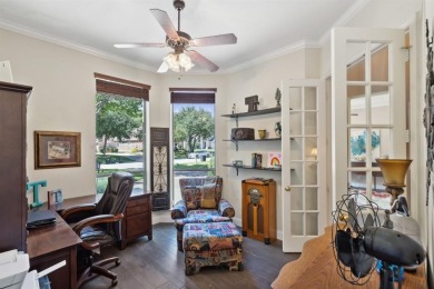 Nestled on a private, gated street overlooking the manicured on Iron Horse Golf Course in Texas - for sale on GolfHomes.com, golf home, golf lot