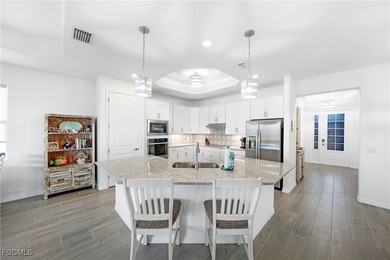 comfort. This nearly new 2-bedroom residence with a den and 2.5 on Heritage Landing Golf  in Florida - for sale on GolfHomes.com, golf home, golf lot