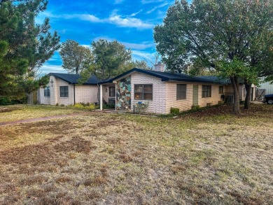 Nestled on a large corner lot in the quaint Meadowlark Hill on Borger Country Club in Texas - for sale on GolfHomes.com, golf home, golf lot