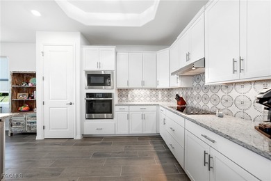 comfort. This nearly new 2-bedroom residence with a den and 2.5 on Heritage Landing Golf  in Florida - for sale on GolfHomes.com, golf home, golf lot