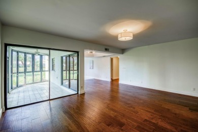 Resort-style and maintenance-free living can be yours in this on Jonathans Landing Golf Club in Florida - for sale on GolfHomes.com, golf home, golf lot