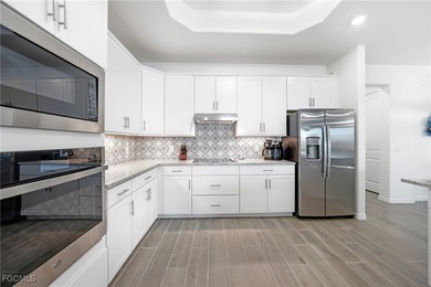 comfort. This nearly new 2-bedroom residence with a den and 2.5 on Heritage Landing Golf  in Florida - for sale on GolfHomes.com, golf home, golf lot