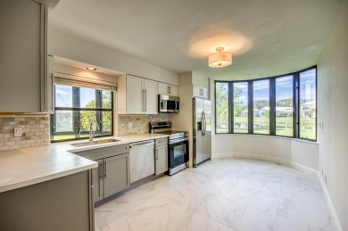 Resort-style and maintenance-free living can be yours in this on Jonathans Landing Golf Club in Florida - for sale on GolfHomes.com, golf home, golf lot