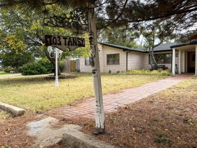 Nestled on a large corner lot in the quaint Meadowlark Hill on Borger Country Club in Texas - for sale on GolfHomes.com, golf home, golf lot