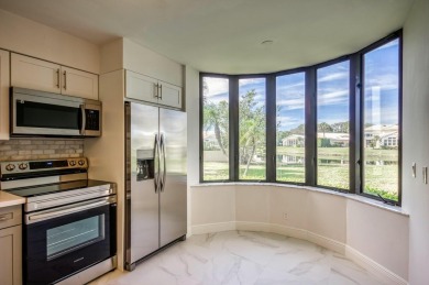 Resort-style and maintenance-free living can be yours in this on Jonathans Landing Golf Club in Florida - for sale on GolfHomes.com, golf home, golf lot