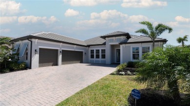 Elegant West Indies-Inspired semi-custom Home in Rivo Lakes - on Serenoa Golf Club in Florida - for sale on GolfHomes.com, golf home, golf lot