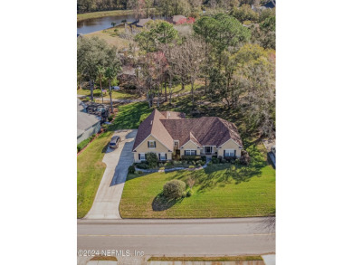 Custom built Cement block and stucco  home on the golf course on Country Club of Orange Park in Florida - for sale on GolfHomes.com, golf home, golf lot