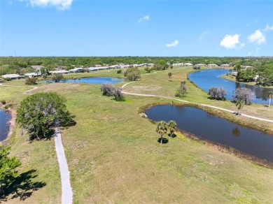 Come and enjoy the beauty and resort style living in this active on Falcon Watch Golf Club in Florida - for sale on GolfHomes.com, golf home, golf lot