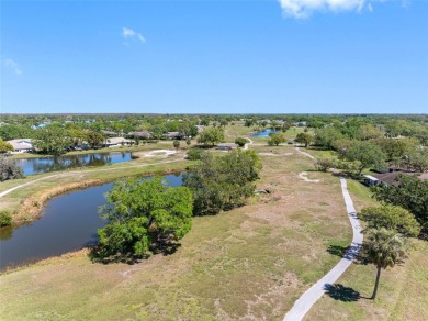 Come and enjoy the beauty and resort style living in this active on Falcon Watch Golf Club in Florida - for sale on GolfHomes.com, golf home, golf lot