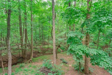 Enjoy the beauty of this elaborate Three Story Custom Built Home on Big Canoe Golf Club - Cherokee in Georgia - for sale on GolfHomes.com, golf home, golf lot