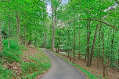 Enjoy the beauty of this elaborate Three Story Custom Built Home on Big Canoe Golf Club - Cherokee in Georgia - for sale on GolfHomes.com, golf home, golf lot
