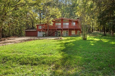 Welcome to a place where every day feels like a getaway. Just on Cherokee Village North Course in Arkansas - for sale on GolfHomes.com, golf home, golf lot