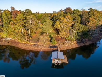 Lakeside Charm & Endless Possibilities on Lake Hartwell! Nestled on Stone Creek Cove Golf Course in South Carolina - for sale on GolfHomes.com, golf home, golf lot