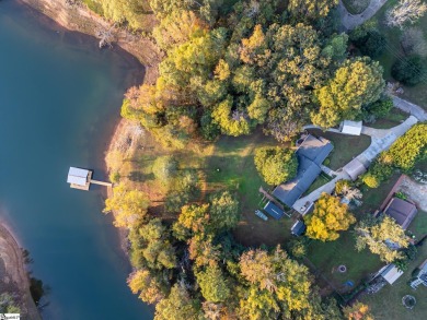 Lakeside Charm & Endless Possibilities on Lake Hartwell! Nestled on Stone Creek Cove Golf Course in South Carolina - for sale on GolfHomes.com, golf home, golf lot