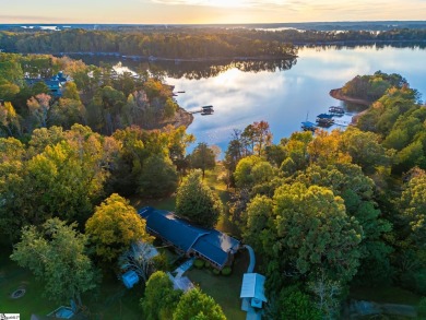 Lakeside Charm & Endless Possibilities on Lake Hartwell! Nestled on Stone Creek Cove Golf Course in South Carolina - for sale on GolfHomes.com, golf home, golf lot