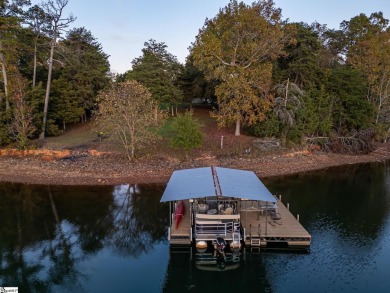 Lakeside Charm & Endless Possibilities on Lake Hartwell! Nestled on Stone Creek Cove Golf Course in South Carolina - for sale on GolfHomes.com, golf home, golf lot