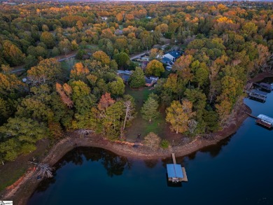 Lakeside Charm & Endless Possibilities on Lake Hartwell! Nestled on Stone Creek Cove Golf Course in South Carolina - for sale on GolfHomes.com, golf home, golf lot