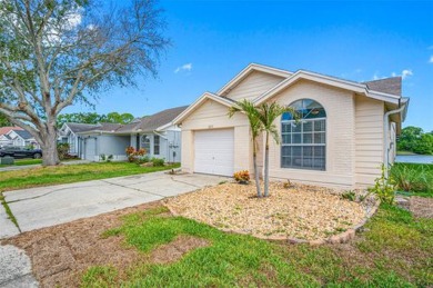 Welcome to your relaxing waterfront retreat! This 3 bedroom 2 on Countryway Golf Course in Florida - for sale on GolfHomes.com, golf home, golf lot