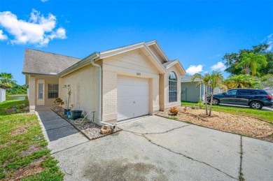 Welcome to your relaxing waterfront retreat! This 3 bedroom 2 on Countryway Golf Course in Florida - for sale on GolfHomes.com, golf home, golf lot