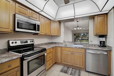 Stunning 2-Bedroom, 2-Bath Condo with Scenic Lake Views in The on The Meadows Golf and Country Club in Florida - for sale on GolfHomes.com, golf home, golf lot