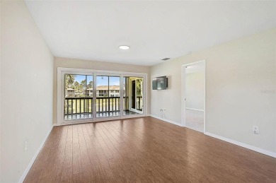 Stunning 2-Bedroom, 2-Bath Condo with Scenic Lake Views in The on The Meadows Golf and Country Club in Florida - for sale on GolfHomes.com, golf home, golf lot
