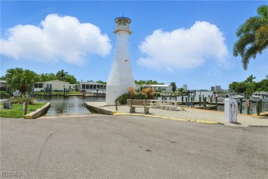 This Home is Truly Special! It starts with a Butterfly Garden on Riverbend Golf and Country Club in Florida - for sale on GolfHomes.com, golf home, golf lot