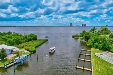 This Home is Truly Special! It starts with a Butterfly Garden on Riverbend Golf and Country Club in Florida - for sale on GolfHomes.com, golf home, golf lot