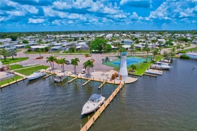 This Home is Truly Special! It starts with a Butterfly Garden on Riverbend Golf and Country Club in Florida - for sale on GolfHomes.com, golf home, golf lot