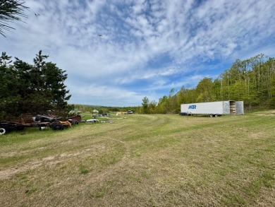 17 acres, the south/road-side is 3.5 acres of open meadow. It on Black Bear Golf Club in Michigan - for sale on GolfHomes.com, golf home, golf lot