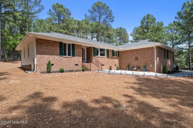 Experience stunning golf course living in this beautifully on Seven Lakes Country Club in North Carolina - for sale on GolfHomes.com, golf home, golf lot