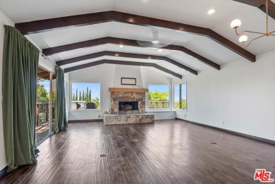 Welcome to your dream retreat in the picturesque Woodland Hills on Woodland Hills Country Club in California - for sale on GolfHomes.com, golf home, golf lot