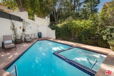 Welcome to your dream retreat in the picturesque Woodland Hills on Woodland Hills Country Club in California - for sale on GolfHomes.com, golf home, golf lot
