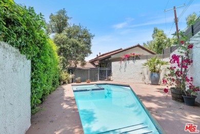 Welcome to your dream retreat in the picturesque Woodland Hills on Woodland Hills Country Club in California - for sale on GolfHomes.com, golf home, golf lot