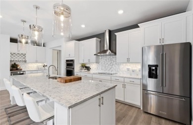 Introducing the stunning Stardom floorplan--new construction and on Valencia Golf and Country Club in Florida - for sale on GolfHomes.com, golf home, golf lot