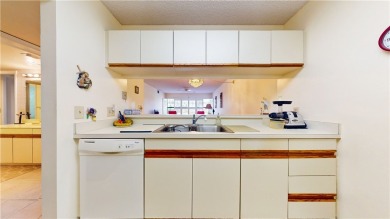 Ground floor unit with lake view.  Washer & Dryer in unit.  Nice on Vista Plantation Golf Club in Florida - for sale on GolfHomes.com, golf home, golf lot