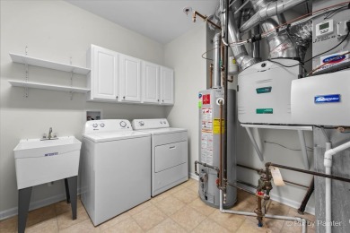 Step into this well-cared-for Mackinac model, freshly painted on Whisper Creek Golf Club in Illinois - for sale on GolfHomes.com, golf home, golf lot