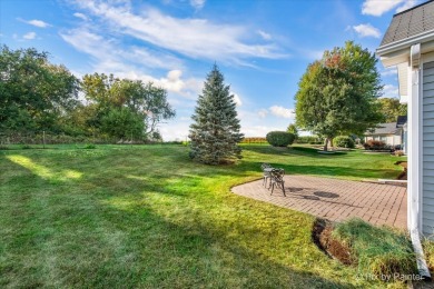 Step into this well-cared-for Mackinac model, freshly painted on Whisper Creek Golf Club in Illinois - for sale on GolfHomes.com, golf home, golf lot