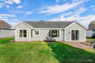 Step into this well-cared-for Mackinac model, freshly painted on Whisper Creek Golf Club in Illinois - for sale on GolfHomes.com, golf home, golf lot