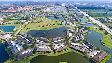 Ground floor unit with lake view.  Washer & Dryer in unit.  Nice on Vista Plantation Golf Club in Florida - for sale on GolfHomes.com, golf home, golf lot