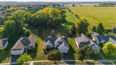 Step into this well-cared-for Mackinac model, freshly painted on Whisper Creek Golf Club in Illinois - for sale on GolfHomes.com, golf home, golf lot