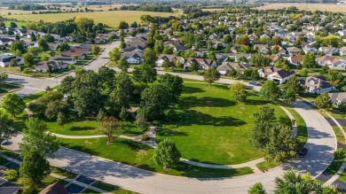 Step into this well-cared-for Mackinac model, freshly painted on Whisper Creek Golf Club in Illinois - for sale on GolfHomes.com, golf home, golf lot