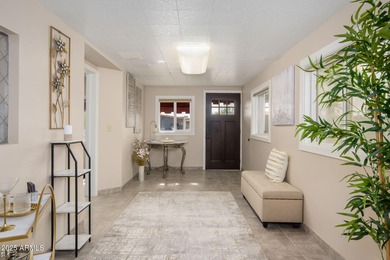 Beautiful 2BR/2BA affixed stucco mobile home with 1716 sf of on Sun Lakes Country Club in Arizona - for sale on GolfHomes.com, golf home, golf lot