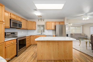 Beautiful 2BR/2BA affixed stucco mobile home with 1716 sf of on Sun Lakes Country Club in Arizona - for sale on GolfHomes.com, golf home, golf lot