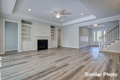 The Otter by American Homesmith offers easy, coastal living in on Lennon Hills Golf Course in North Carolina - for sale on GolfHomes.com, golf home, golf lot