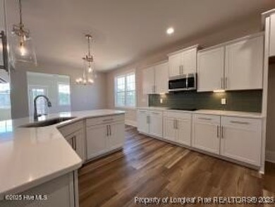 Limited-Time Buyer Incentives Include: 1-Year Golf Membership to on Kings Grant Golf and Country Club in North Carolina - for sale on GolfHomes.com, golf home, golf lot
