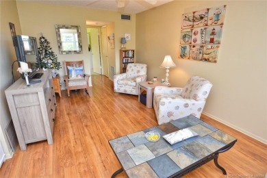 Step into this cozy, beachy-theamed condo and you won't want to on Pine Lakes Golf Club in Florida - for sale on GolfHomes.com, golf home, golf lot