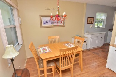 Step into this cozy, beachy-theamed condo and you won't want to on Pine Lakes Golf Club in Florida - for sale on GolfHomes.com, golf home, golf lot