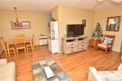 Step into this cozy, beachy-theamed condo and you won't want to on Pine Lakes Golf Club in Florida - for sale on GolfHomes.com, golf home, golf lot