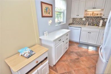 Step into this cozy, beachy-theamed condo and you won't want to on Pine Lakes Golf Club in Florida - for sale on GolfHomes.com, golf home, golf lot